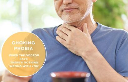 Person holding throat — choking phobia, fear of swallowing (phagophobia) concept
