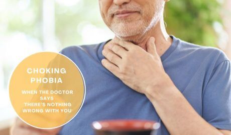 Person holding throat — choking phobia, fear of swallowing (phagophobia) concept